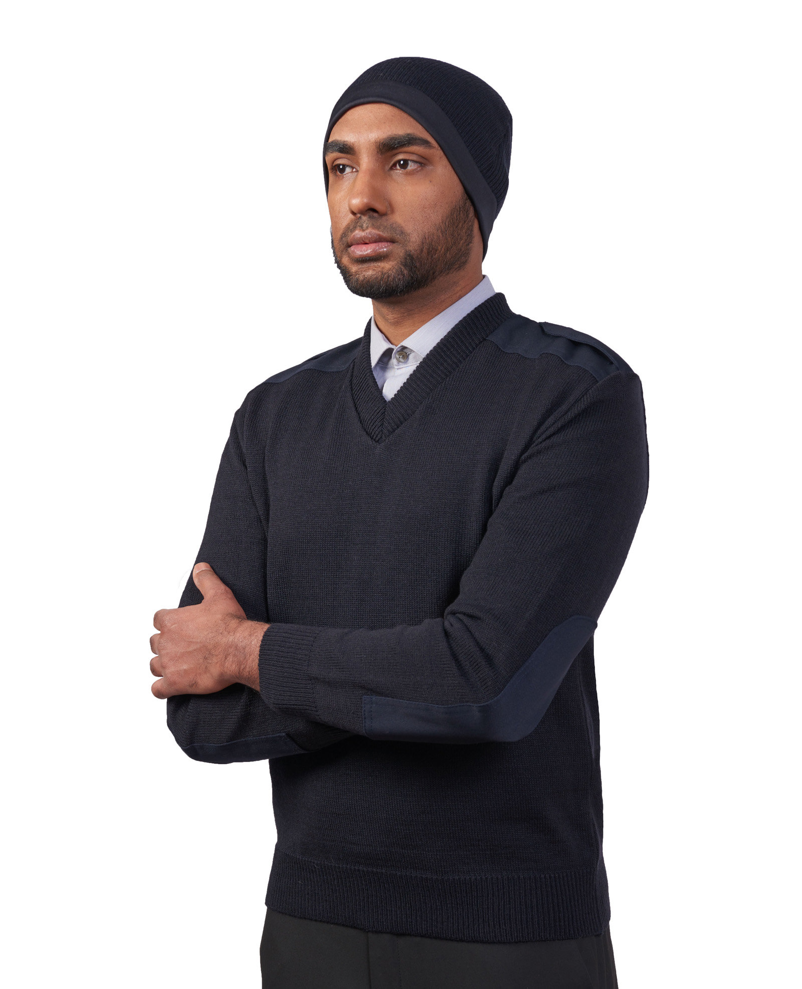 Man in navy v-neck knit sweater with shoulder and elbow patches