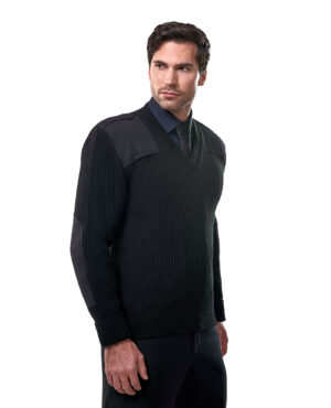 man in thick navy v-neck knit sweater with shoulder and elbow patches