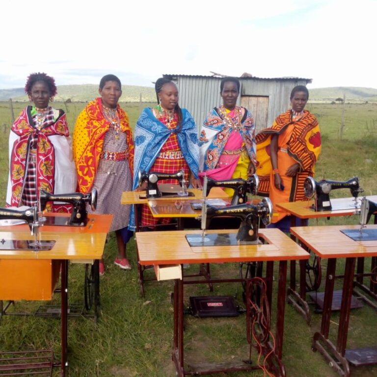 African women with donated sowing machines