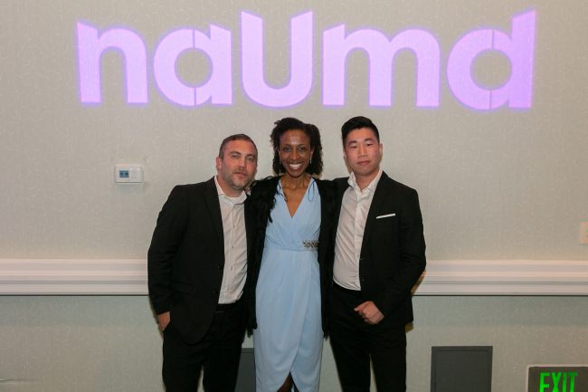 The COBMEX® Team at the NAUMD Awards Banquet: Jon Edberg, Pricila Neal, and Chi Dam.