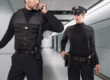 Pair of police officers with police uniform on
